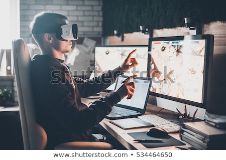 Foto stock: Creative Man In Virtual Reality Headset At Office