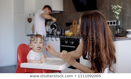 Stock foto:  Girl And Her Daddy With Apple Background