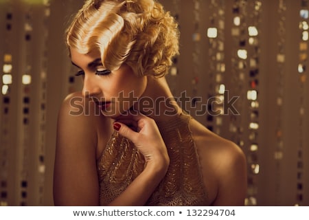 Zdjęcia stock: Young Woman In Little Gold Dress