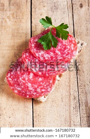 Stok fotoğraf: Crispy Bread With Salami Spread