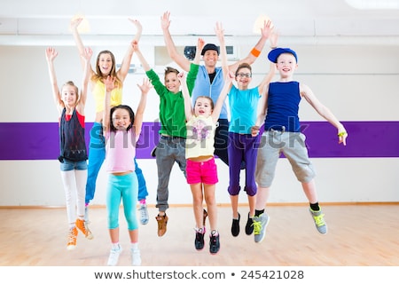 Cheerful Fitness Trainer Dancing In Joy Foto d'archivio © Kzenon