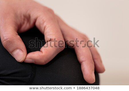 Stock foto: Closeup Part Of Female Body Meditating Focus On Fingers