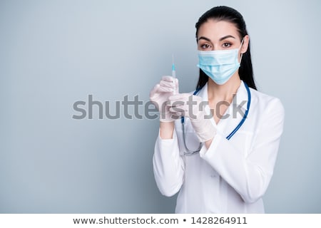 Stock fotó: Photo Of A Nurse Preparing A Vaccine Injection