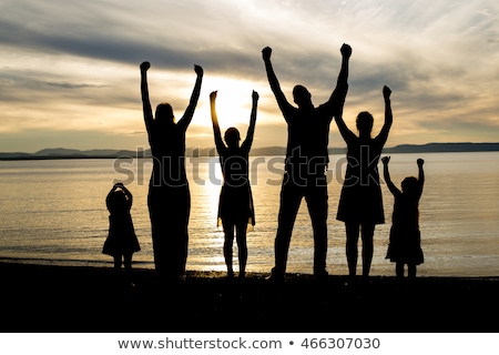 Six Family Member At Beach Silhouette Sunset Foto d'archivio © Lopolo