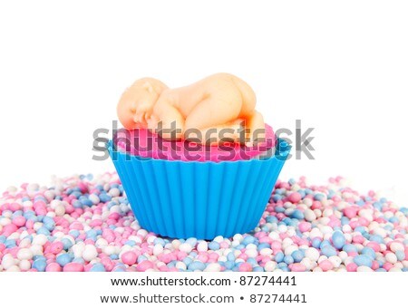 Foto d'archivio: Birth Cupcake With Marzipan Baby And Colorful Mice Sweets