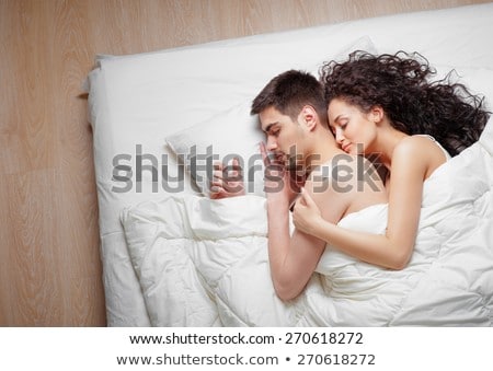 Foto stock: Peaceful Lovers Sleeping Together At Home