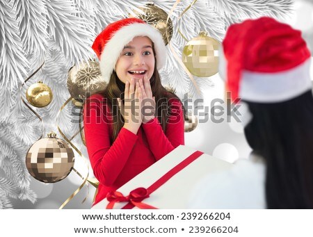 Stock photo: Composite Image Of Little Girl Getting Gift