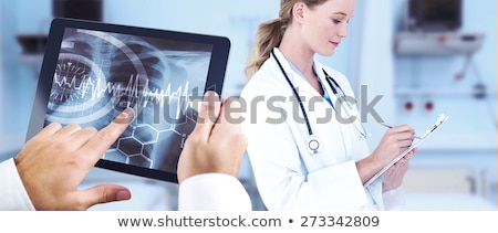 Stock fotó: Composite Image Of Man Using Tablet Pc