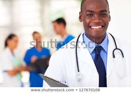 Stock photo: Happy African Medical Intern Doctor On Studio White