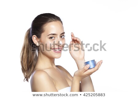 Stock fotó: Portrait Of Beautiful Woman Applying Some Cream To Her Face For Skin Care