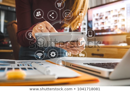 Stockfoto: Businesswoman Working On Digital Tablet