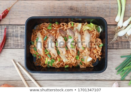 Zdjęcia stock: Chopsticks Taking Roasted Pork Slice