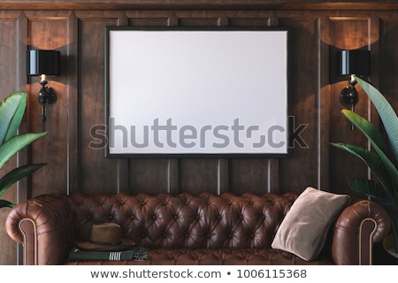Stock photo: Gallery Interior With Empty Frame And Light On Wall