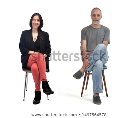 Foto stock: Woman Sitting On The Chair Isolated On White
