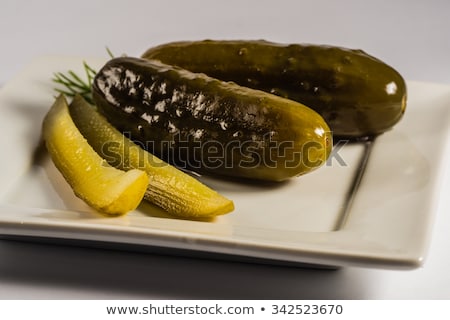 Stock photo: Dill Pickles On A Plate Close Up