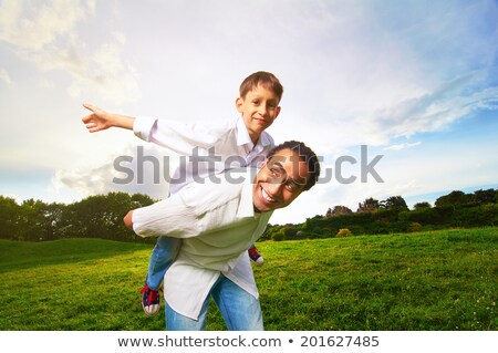 Foto stock: African Man And Son At Sunset