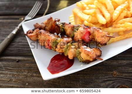 Stok fotoğraf: Pork Skewer And French Fries