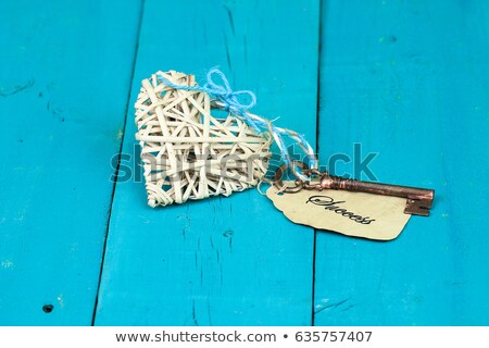 Stock fotó: Door Key With An Attached Heart Tag