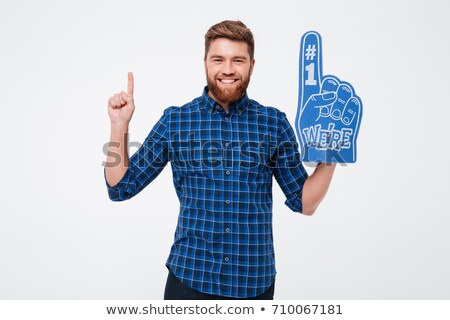 Stock fotó: Cheerful Man With Fan Finger Pointing Up Isolated