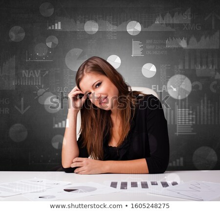 Foto stock: Manager At The Office Making Reports And Statistics With Blackboard Background