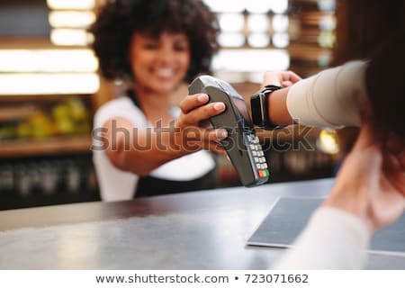 Stockfoto: Businesswoman Using A Smart Watch