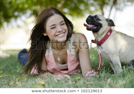 Foto stock: Pretty Young Woman Spending Time At The Park