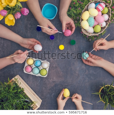Stock photo: Basket Of Brightly Coloured Easter Eggs