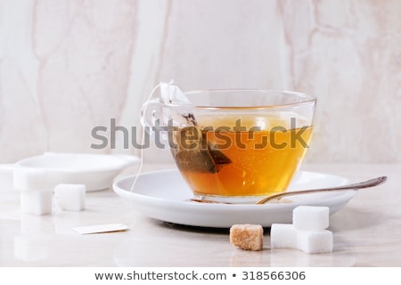 Foto stock: Black Tea With Sugar Cubes