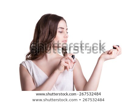 Woman Spraying Perfume On Her Neck Zdjęcia stock © Julenochek