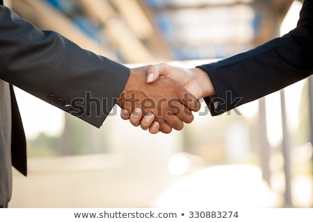 Foto stock: Closeup Of People Shaking Hands Black And White