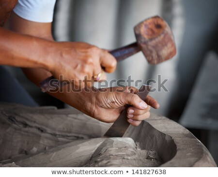 Stockfoto: Hands Woodcarver While Working With The Tools