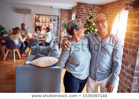 Stok fotoğraf: Couple Celebrating Christmas At Home