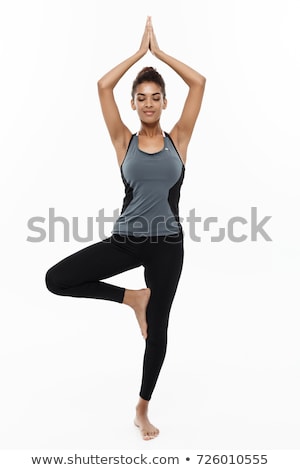 Stock photo: Woman Doing Exercises Isolated On The White