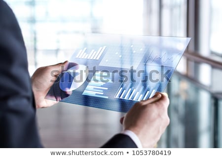 Stock fotó: Businessman With Transparent Tablet And Hologram