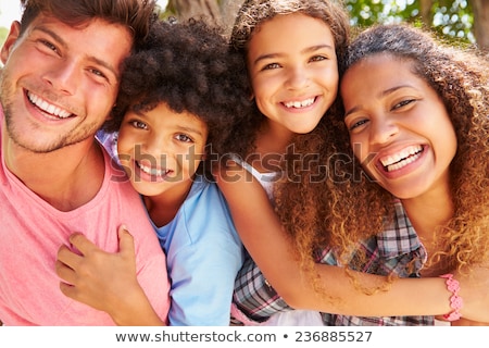 [[stock_photo]]: Mixed Race Hispanic And Caucasian Son And Father Having Fun At T