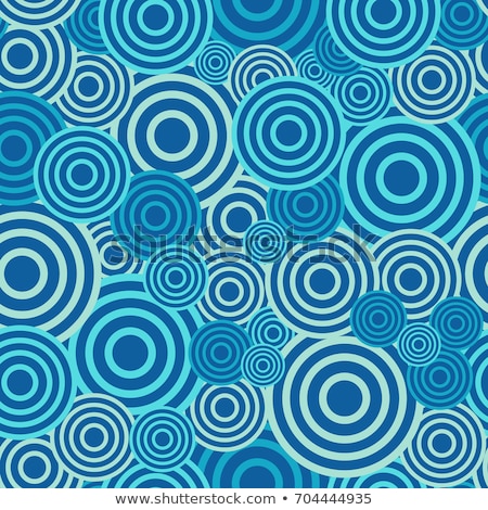 Foto d'archivio: Seamless Concentric Circle Backdrop Pattern In Blue