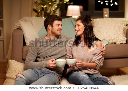 Foto stock: Happy Couple Drinking Cacao At Home