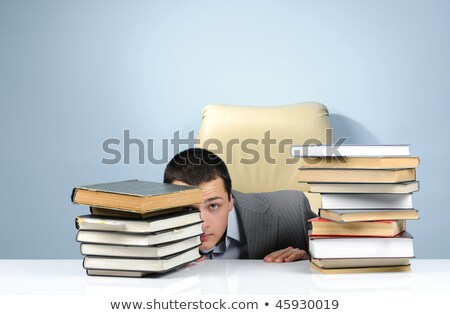 [[stock_photo]]: Businessman Hiding In The Office Isolated On White