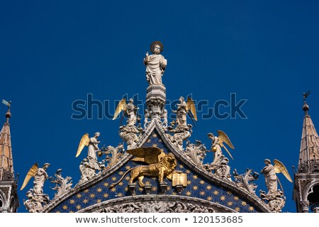 Stok fotoğraf: Statues On The Top Of St Marks Basilica At Venice Italy