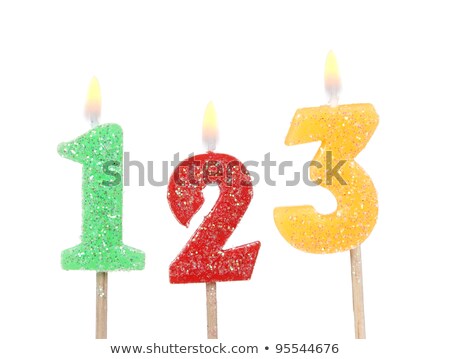 Stockfoto: Row Of Three Candles In Black And White