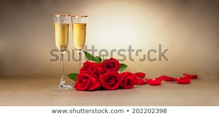 Zdjęcia stock: Two Champagne Glasses In Front Of Christmas Presents