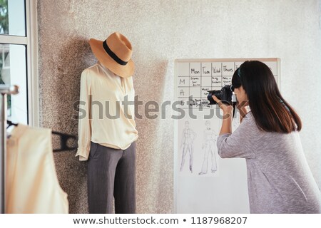 ストックフォト: Designer Photographing Her Garment