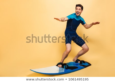 Сток-фото: Man With Surf Board On Beach