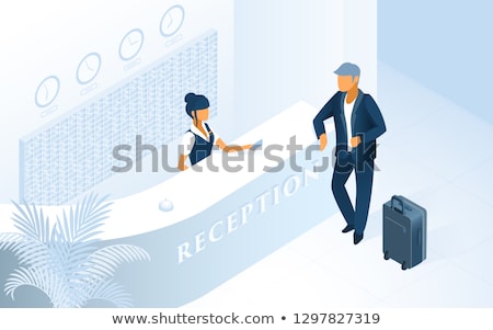 Stock fotó: Receptionist Welcoming A Newly Arrived Hotel Guest