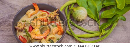 Foto stock: Thai Food Chicken Green Curry On Dark Wooden Background Top View Banner Long Format