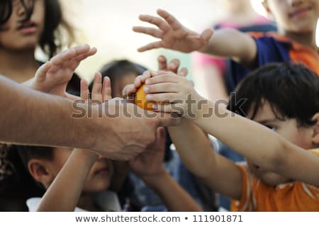 Stockfoto: Hungry Children In Refugee Camp Distribution Of Humanitarian Food