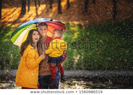 Stockfoto: Happy Family Under Rainbow