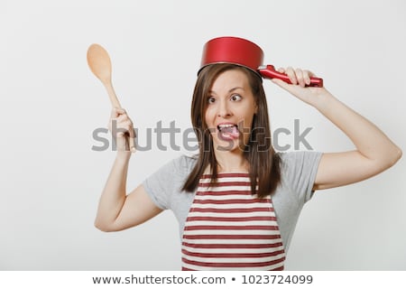 Stock photo: Young Housewife With Kitchen Utensil