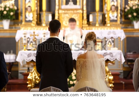 Foto stock: Catholic Golden Dress