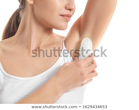 [[stock_photo]]: Oins · du · corps · jeune · femme · appliquant · un · déodorant